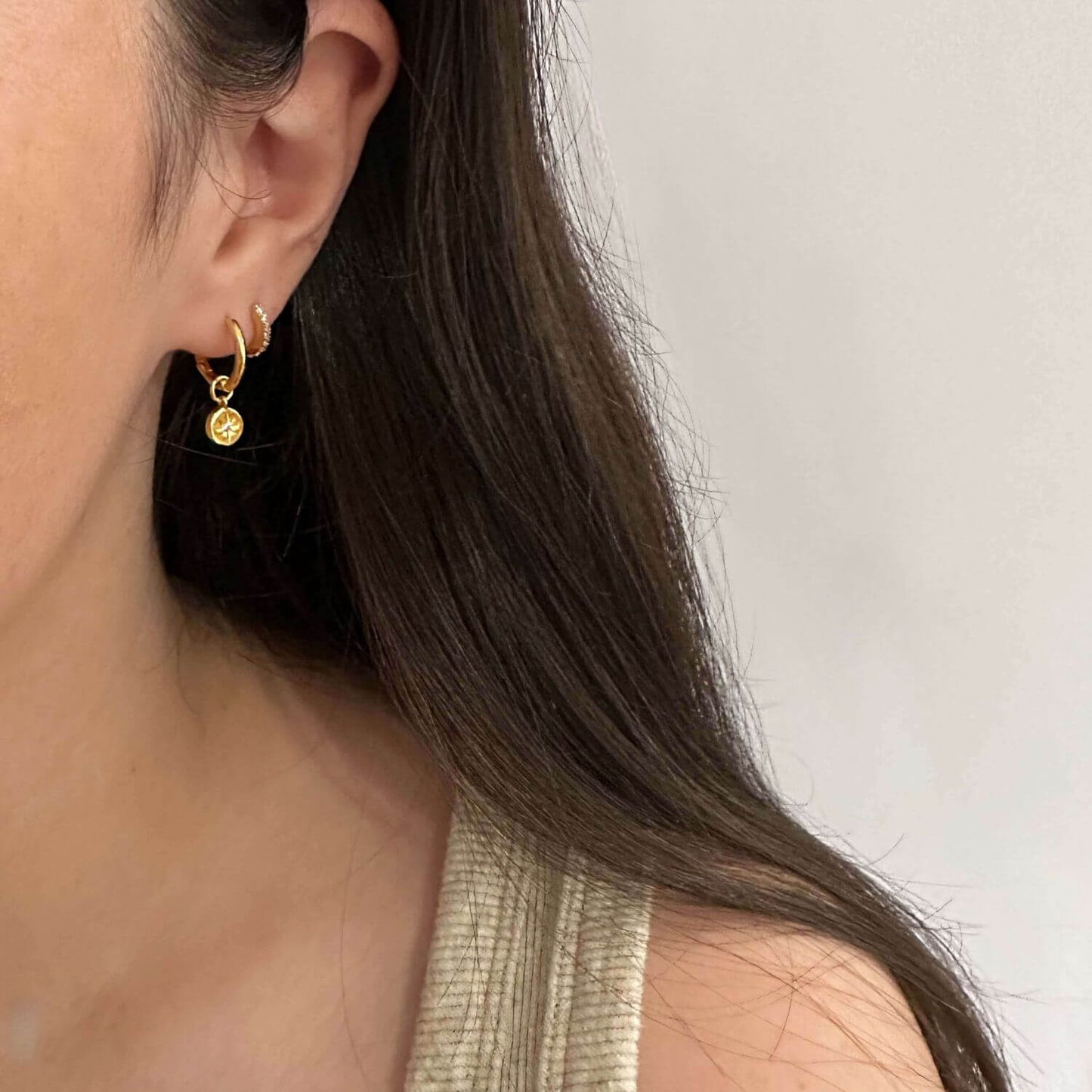 18K gold plated drop down hoops. 1.5 Microns gold plated. Hoop earrings. Tarnish resistant. Perfect earrings stack gold.